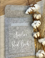 Personalised Red Book cover, designed to protect your child’s health record in a stylish, durable felt finish.